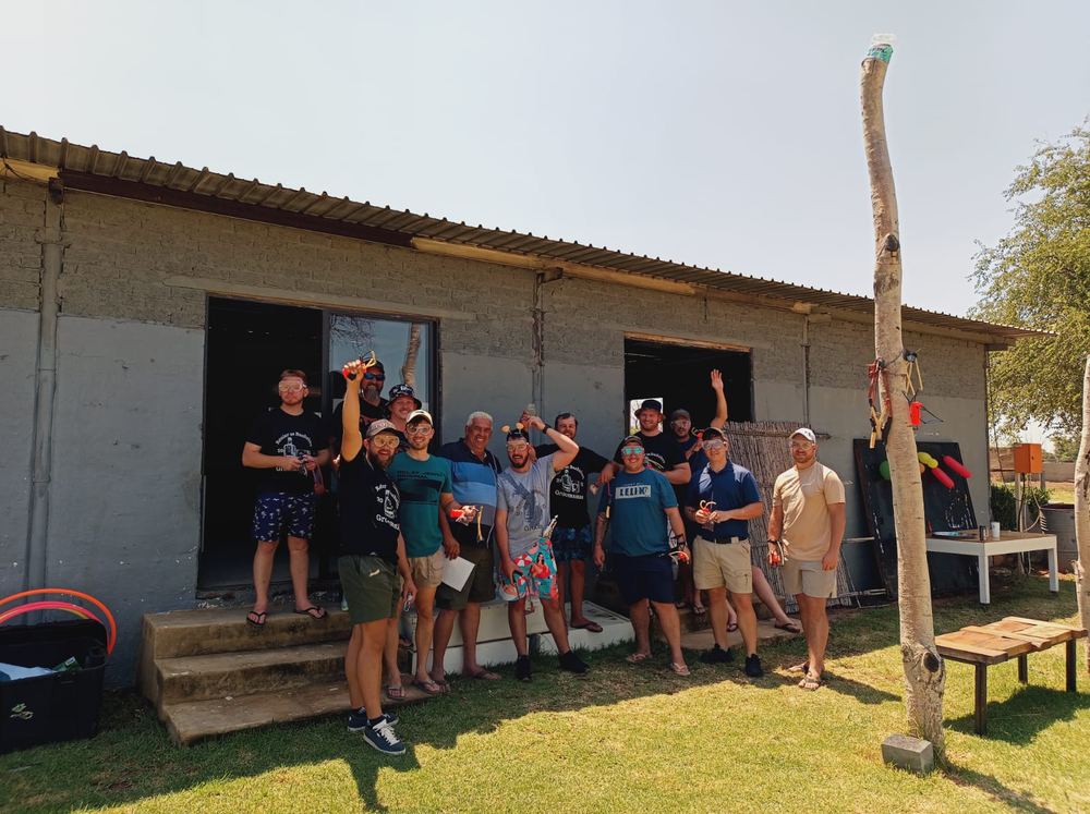Group celebrating outside the bar