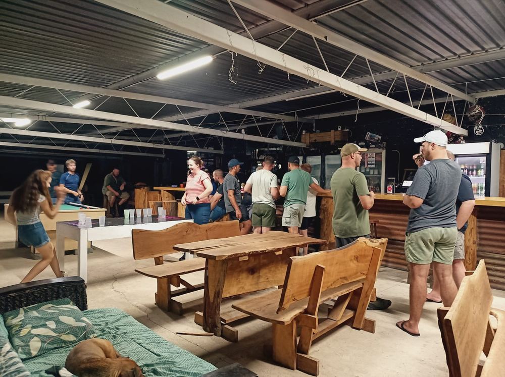 Group celebrating inside the bar